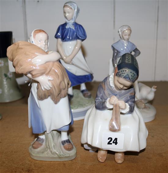 Four Royal Copenhagen figures, numbered 527, 528, 908 and 1314